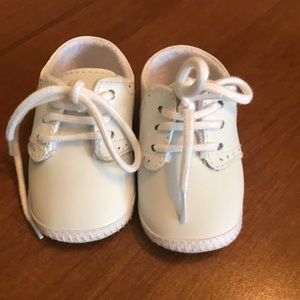 White leather baby shoes